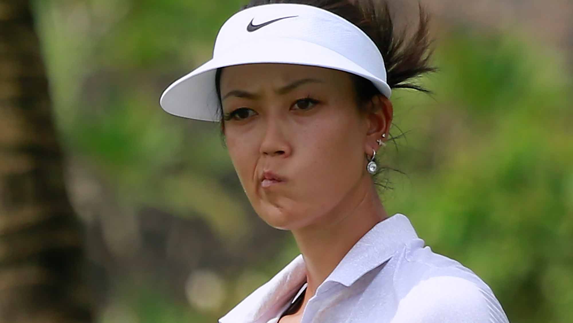 Michelle Wie of United States reacts after her putt at her putt at 18th hole during Round 2 of Blue Bay LPGA