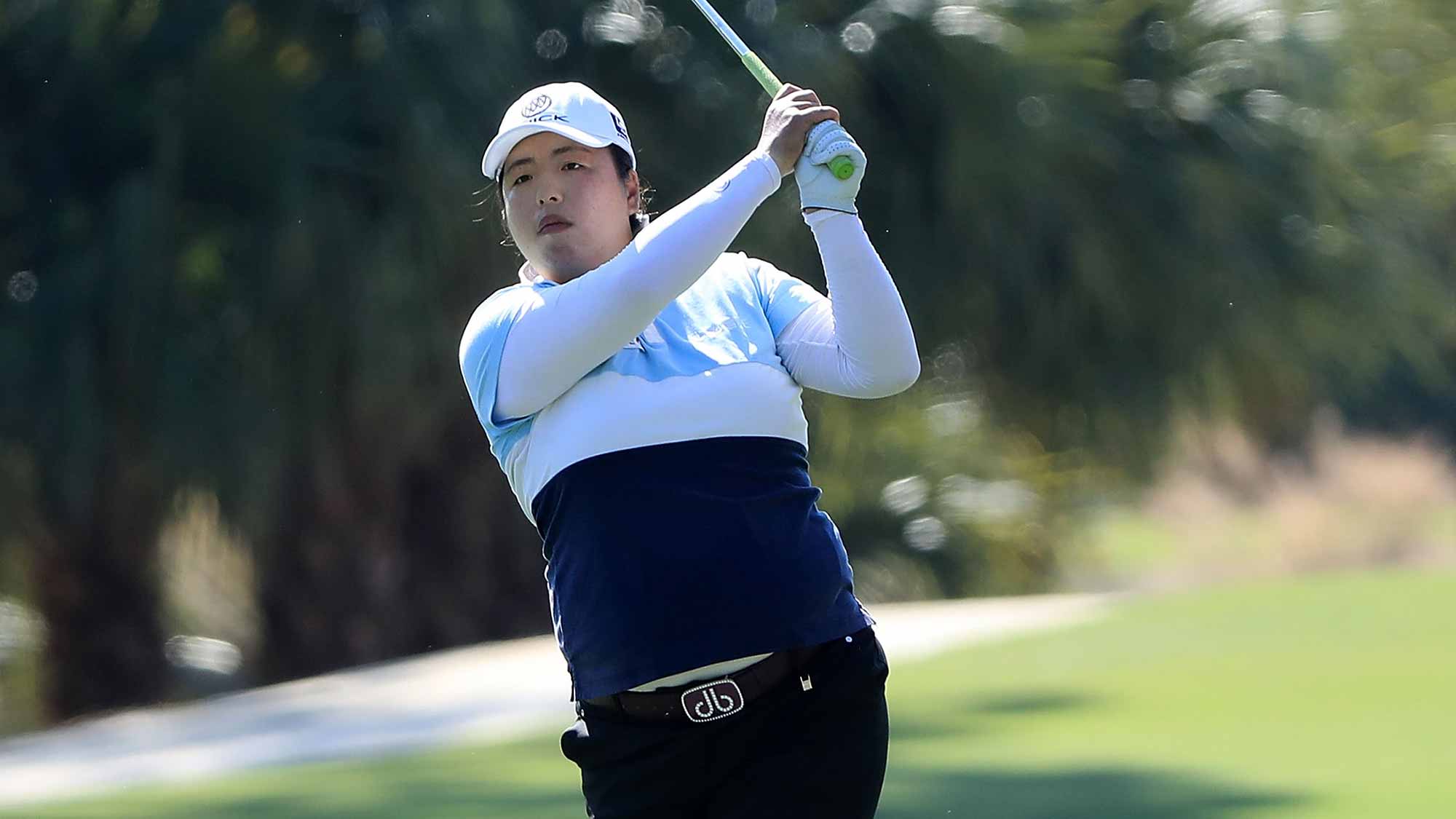 Shanshan Feng of China plays her shot on the second hole during the second round of the CME Group Tour Championship at Tiburon Golf Club