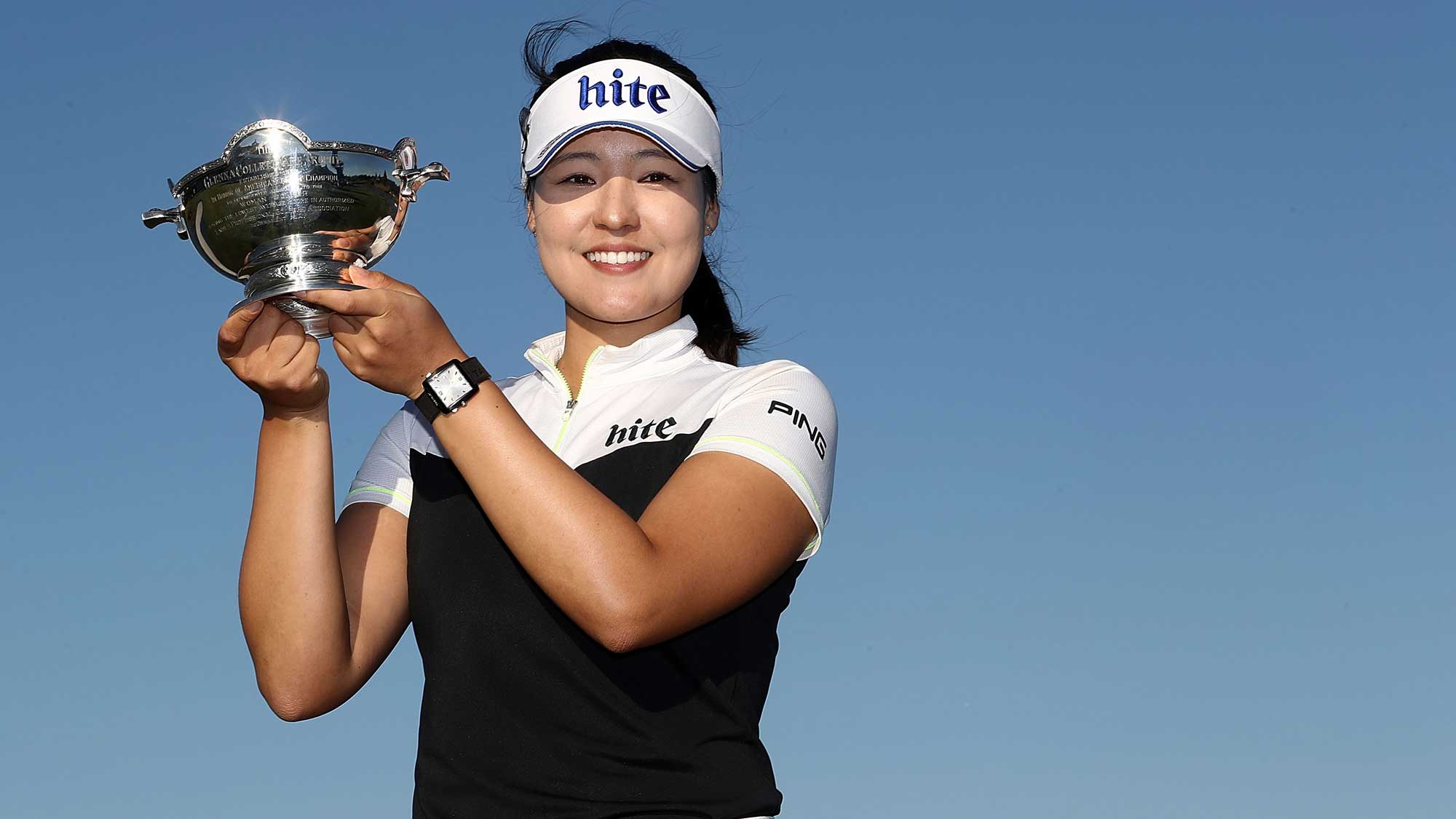 In Gee Chun of Korea poses with the Vare trophy during the final round of the CME Group Tour Championship at Tiburon Golf Club
