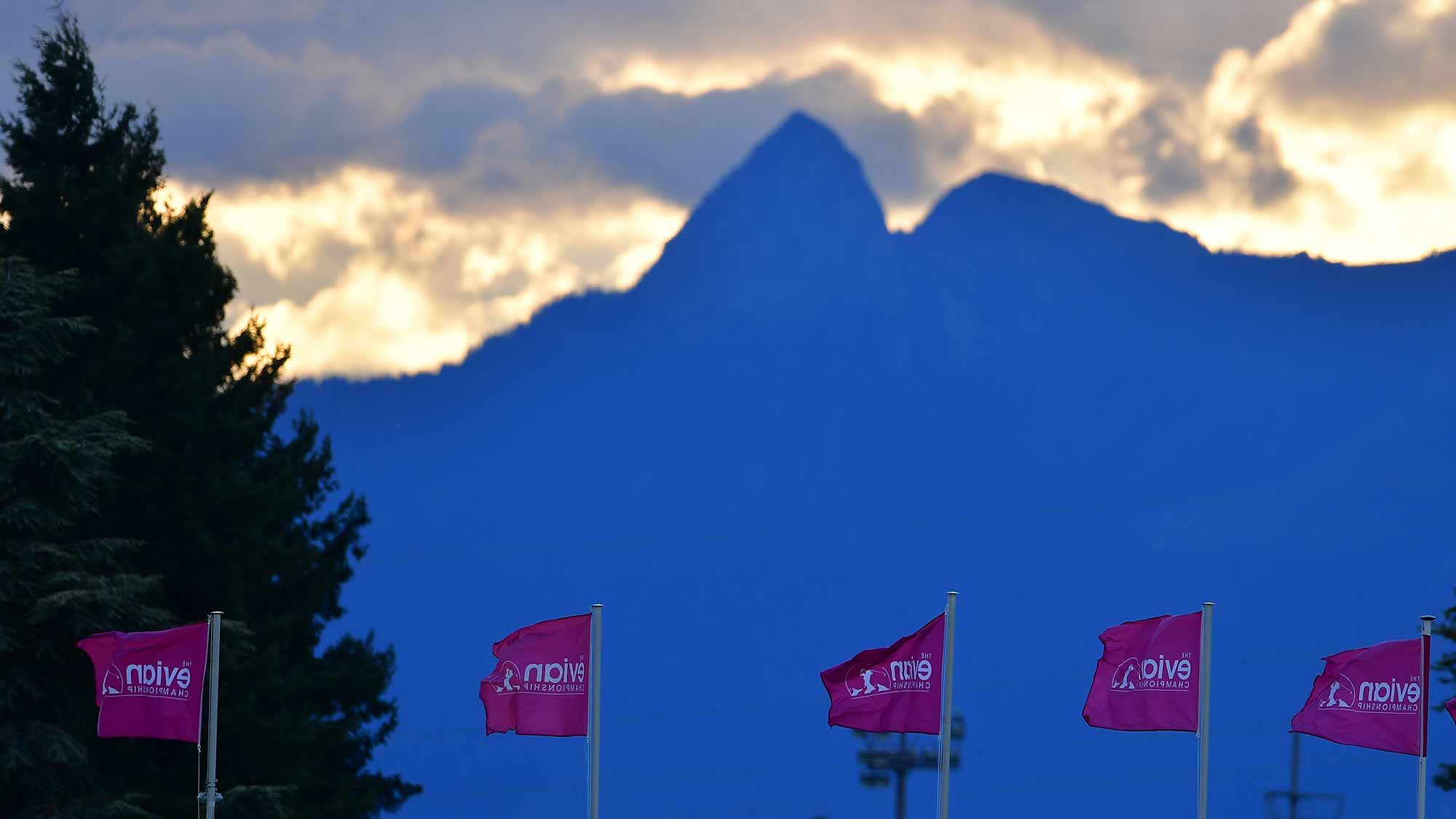 The sun rises above the Alps before the first round of the Evian Golf Club in Evian-les-Bains, France. 