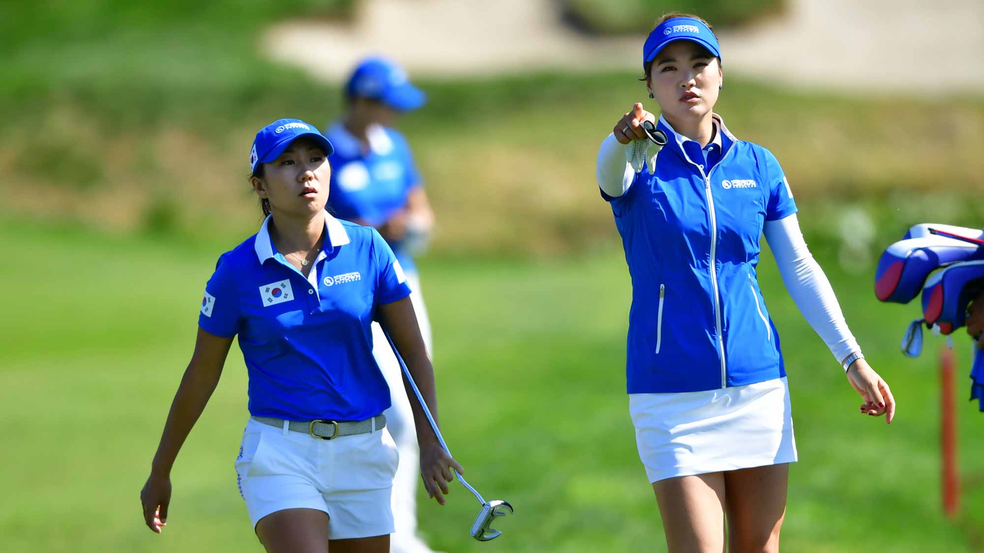 In-Kyung Kim and So Yeon Ryu walk together during the Tuesday practice round at the UL International Crown at Jack Nicklaus Golf Club Korea