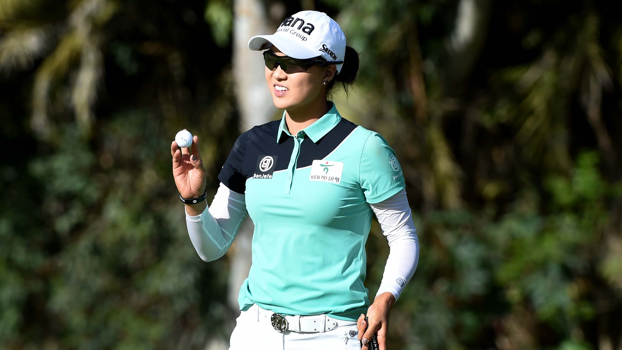 Minjee Lee of Australia acknowledges the gallery after sinking a putt on the 15th hole during the second round of the Kia Classic
