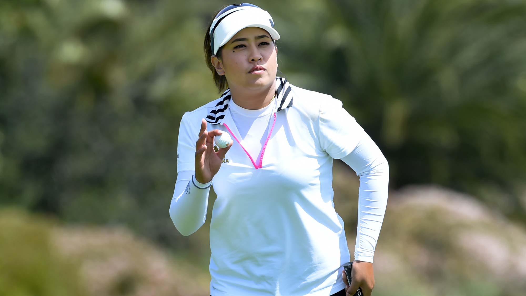 Thidapa Suwannapura of Thailand acknowledges the gallery after sinking a putt during the second round of the Kia Classic