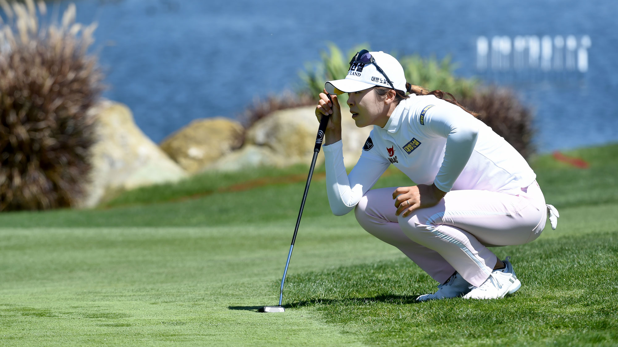 Mi Jung Hur of Korea lines up her putt on the 18th green on the way to shooting a course record 10 under par 62 during the third round of the Kia Classic 