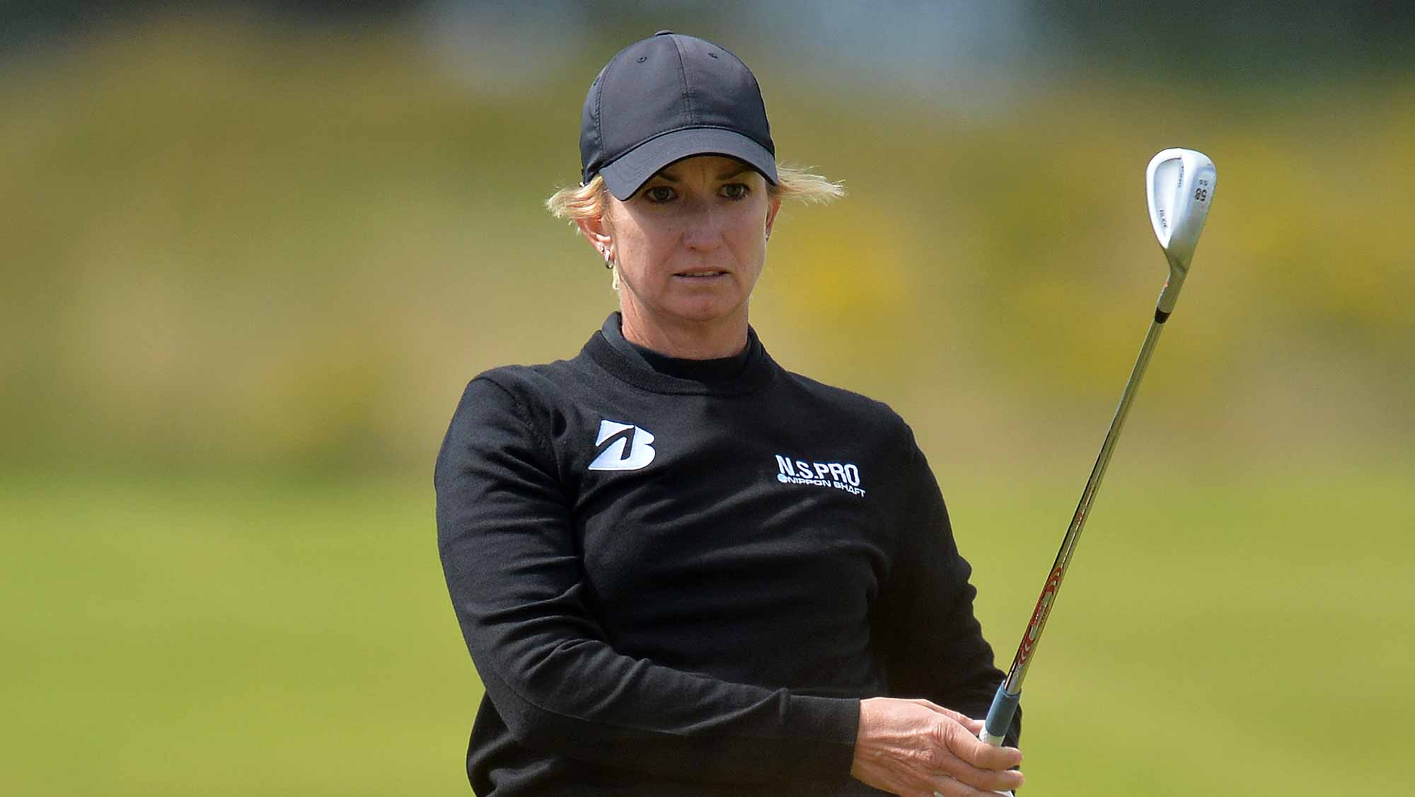 Karrie Webb of Australia plays her second shot at the 18th hole during the second day of the Aberdeen Asset Management Ladies Scottish Open at Dundonald Links Golf Course